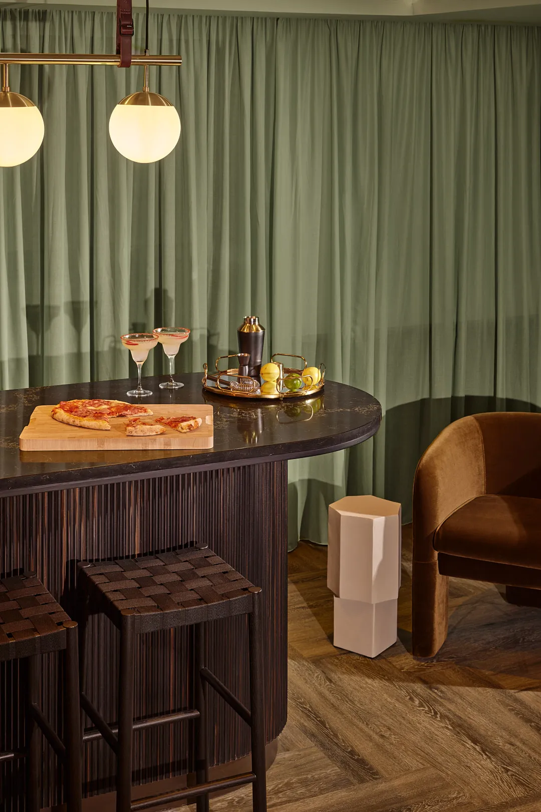 bar area with pizza and stool seating