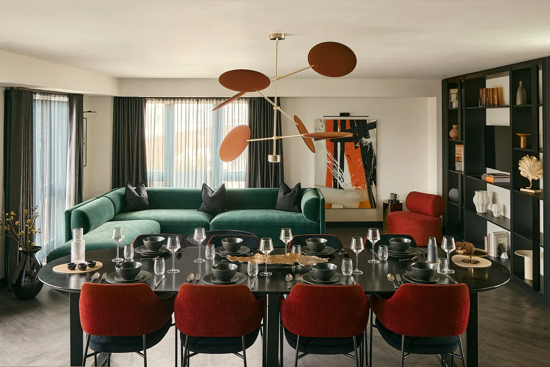 Private dining room with 8 seater dining table and corner sofa